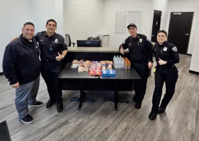 A group of EMS workers standing with snacks and drinks