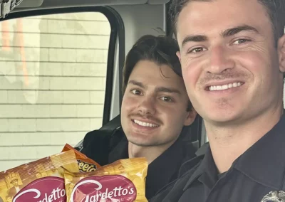 Premier Ambulance EMS workers enjoying snacks inside their ambulance.