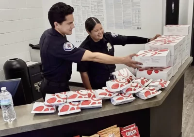 EMS workers lining up Chik-fil-a boxes to hand out to other EMS workers