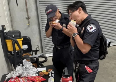 Premier Ambulance EMS workers enjoying burritos
