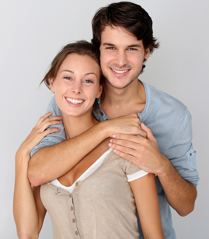 a young adult couple smiling