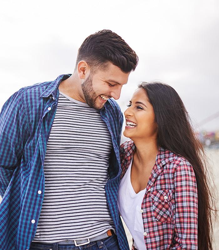 Young adult couple happy with each other