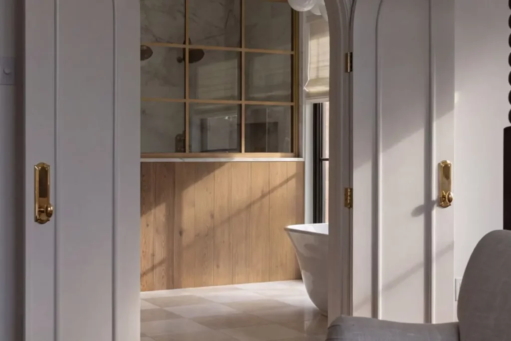 French doors opening to a bathroom