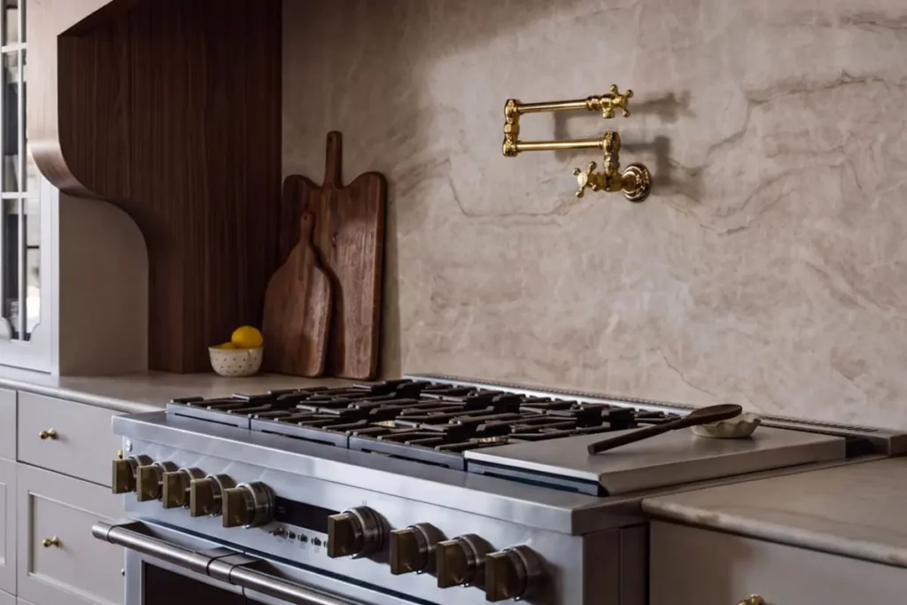 Granite countertops with wooden cutting boards and a brand new stovetop
